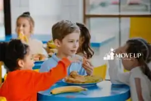 Kids having lunch together in a canteen