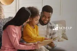 a parents and their child reading a book