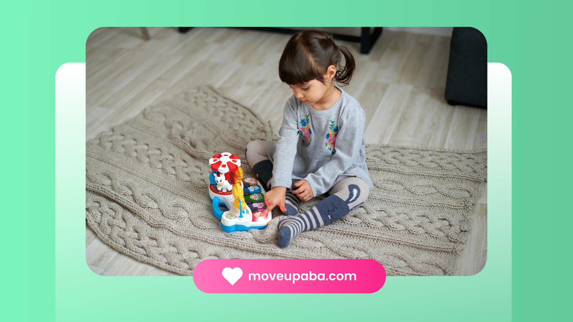 A young child participating in ABA therapy in Indianapolis, playing with a colorful toy on a knitted rug