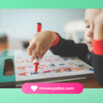 An autistic child drawing with a red marker on a colorful board during an ABA therapy session