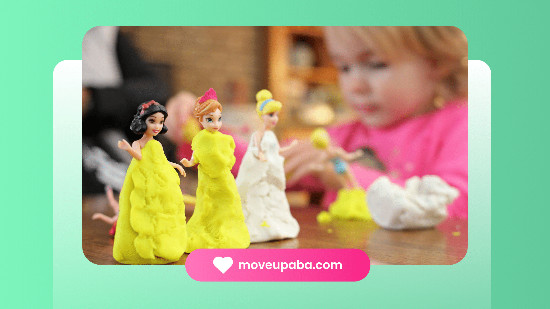 An autistic child playing w/ princess dolls in playdough dresses at ABA therapy center in Maryland.