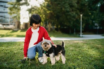 Autism child play her dog