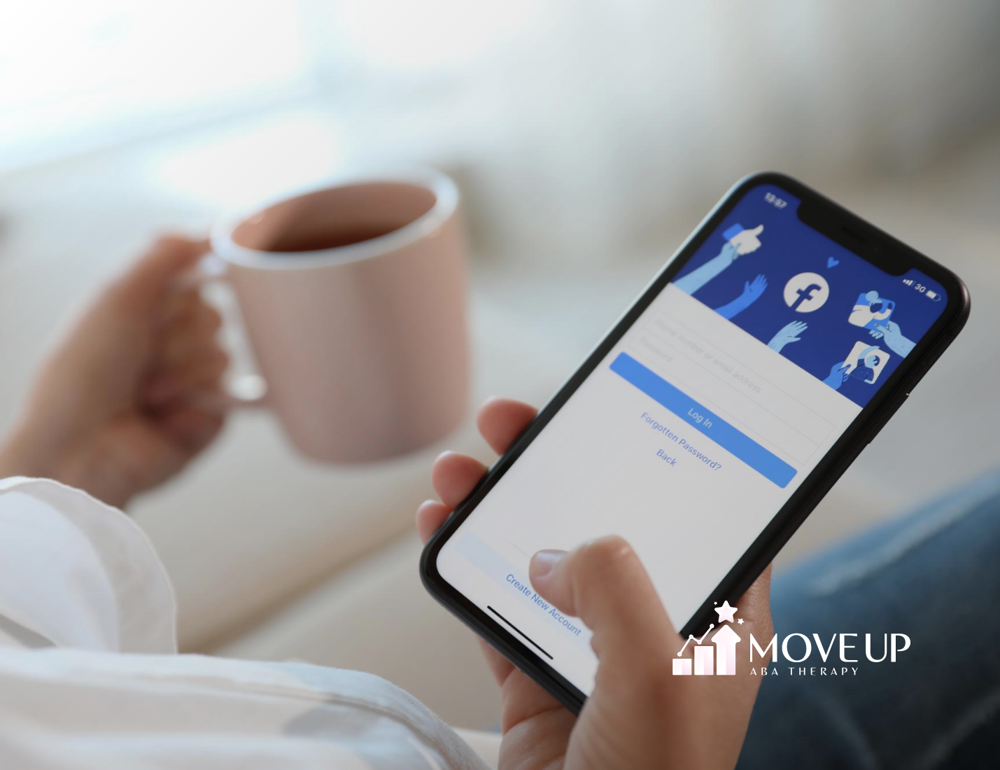 A phone with the Facebook app, representing Mark Zuckerberg