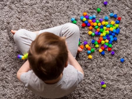 Autism child playing lego