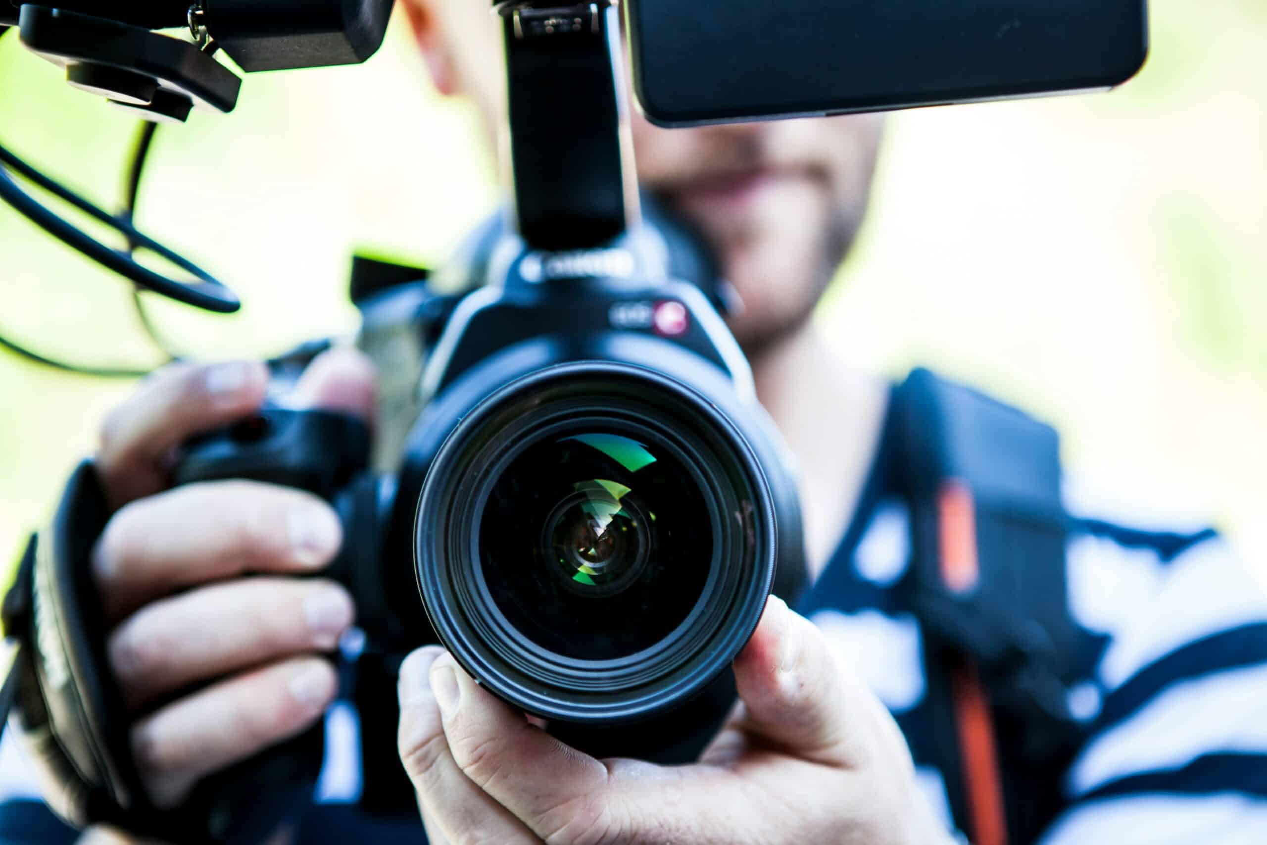 guy with a filming camera for messi condition