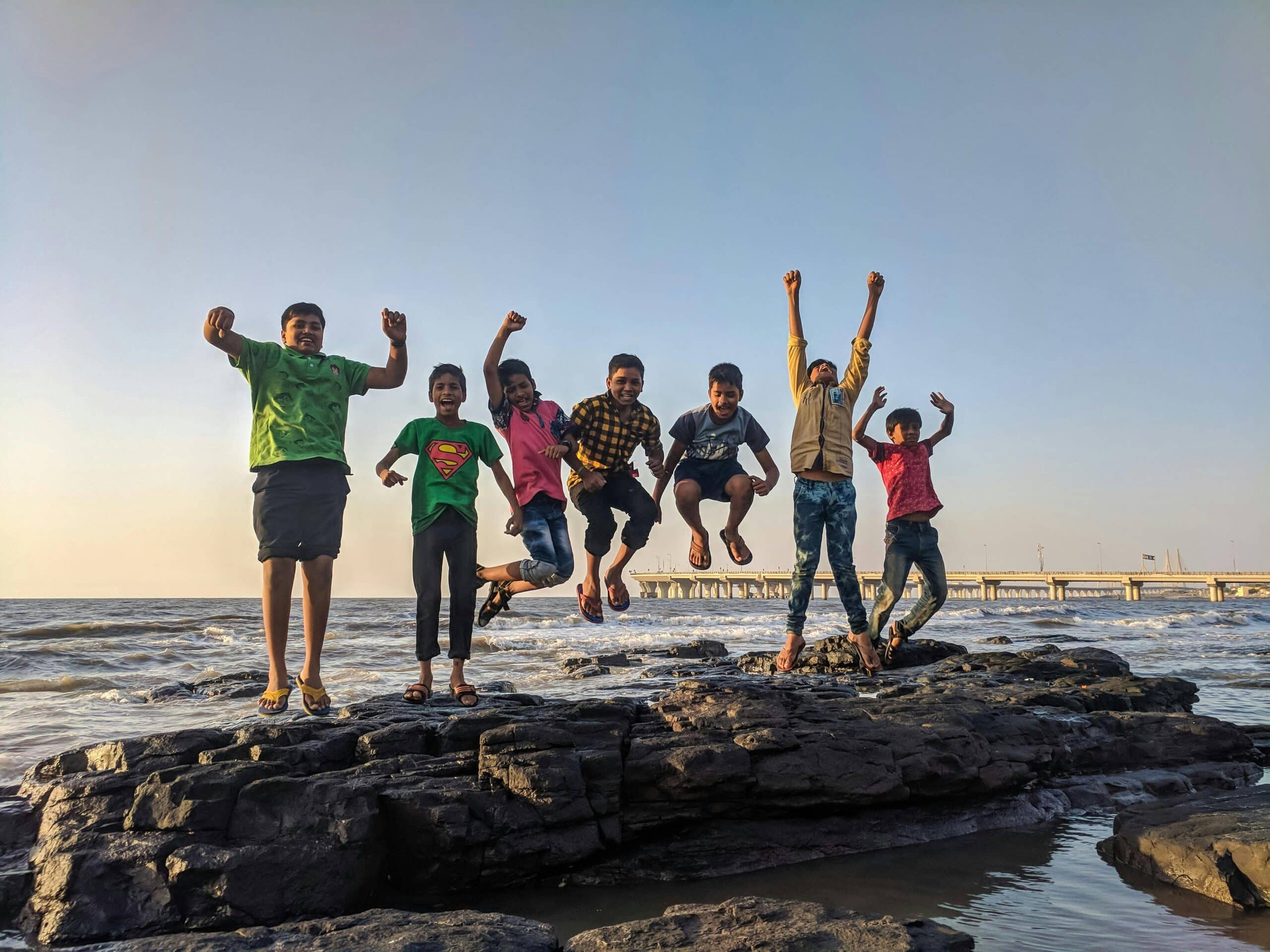 peer support with kids on a beach