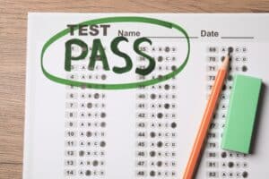 rbt exam passing score test passed with pen and eraser