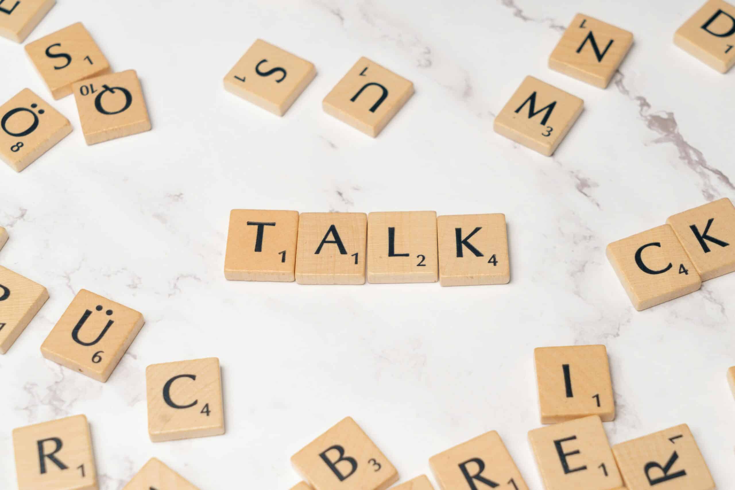 scrabble spelling out talk to represent autism approach