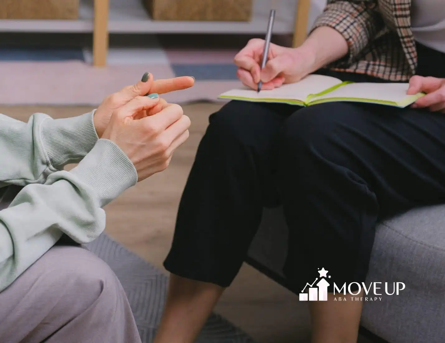 An ABA Therapist doing a session