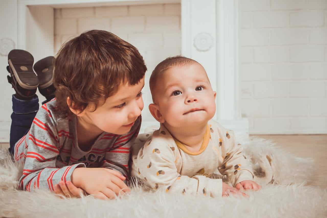 toddler with his baby brother for aba therapy and social skills