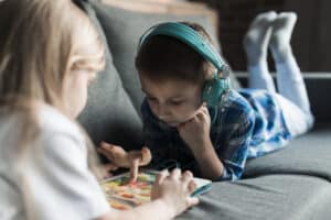 Autism Spectrum Disorders a boy playing ipad