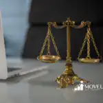 Antique-style scales of justice in a modern office setting