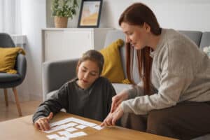 Understanding Autism girl playing with her mother