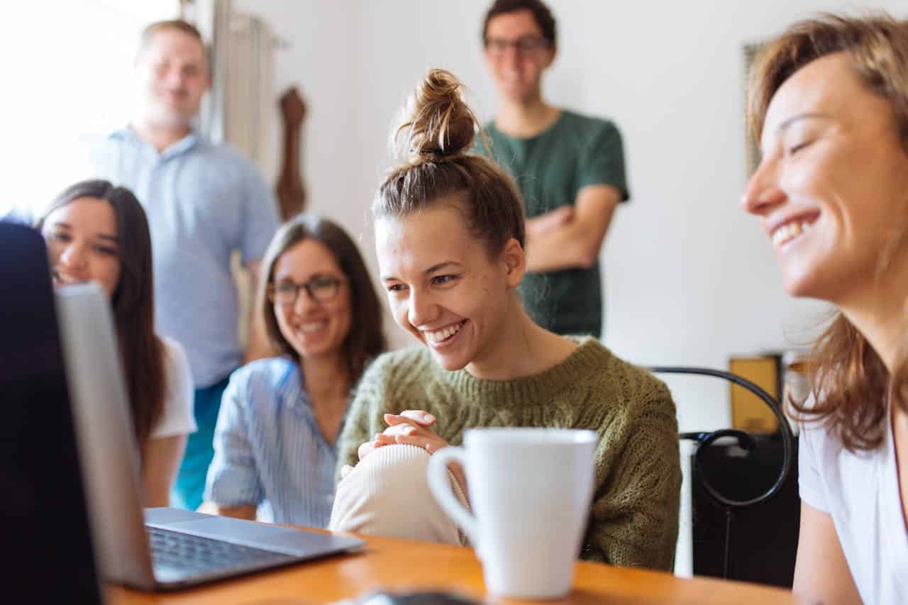 autism support group looking at the laptop for an exercise