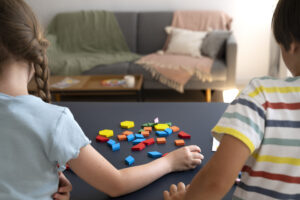 autistic or adhd girl and boy playing 