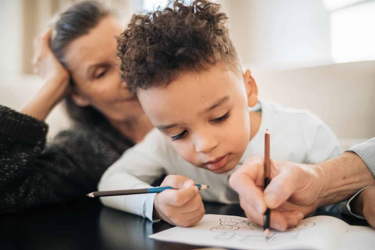 child writing on paper what is aba therapy