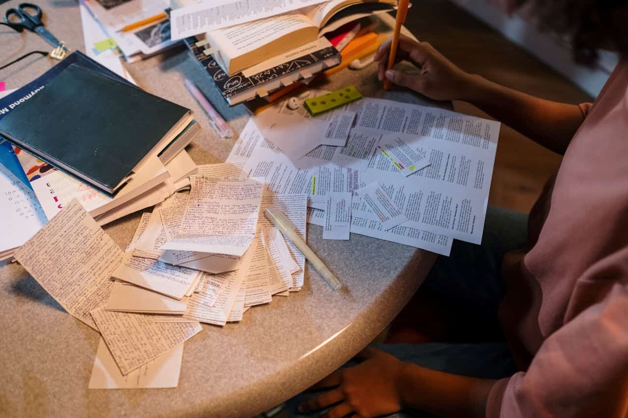 disarrayed papers on desk to reach the RBT exam pass rate