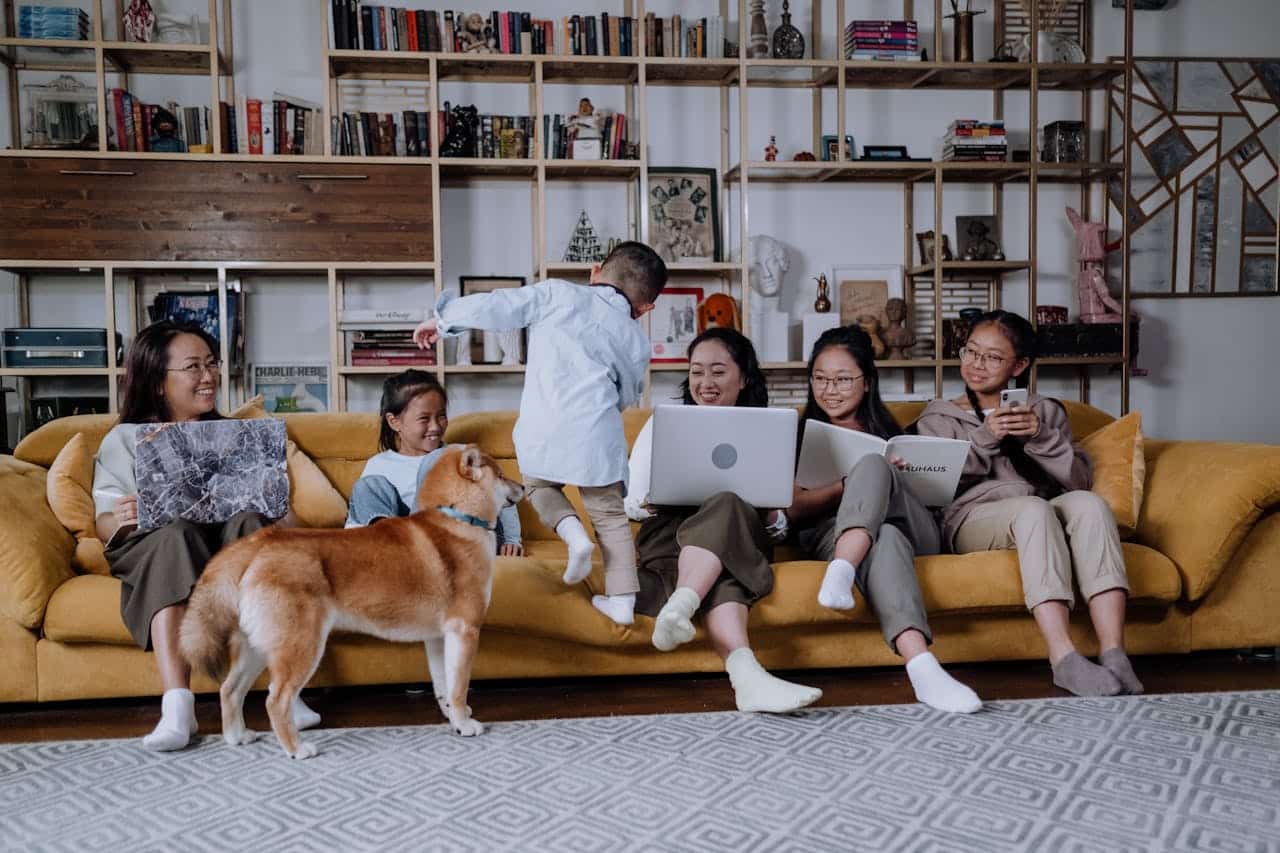 family on the sofa laughing