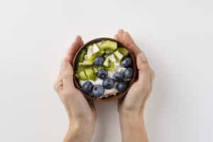 healthy dishes for picky eaters girl holding bowl with healthy foods