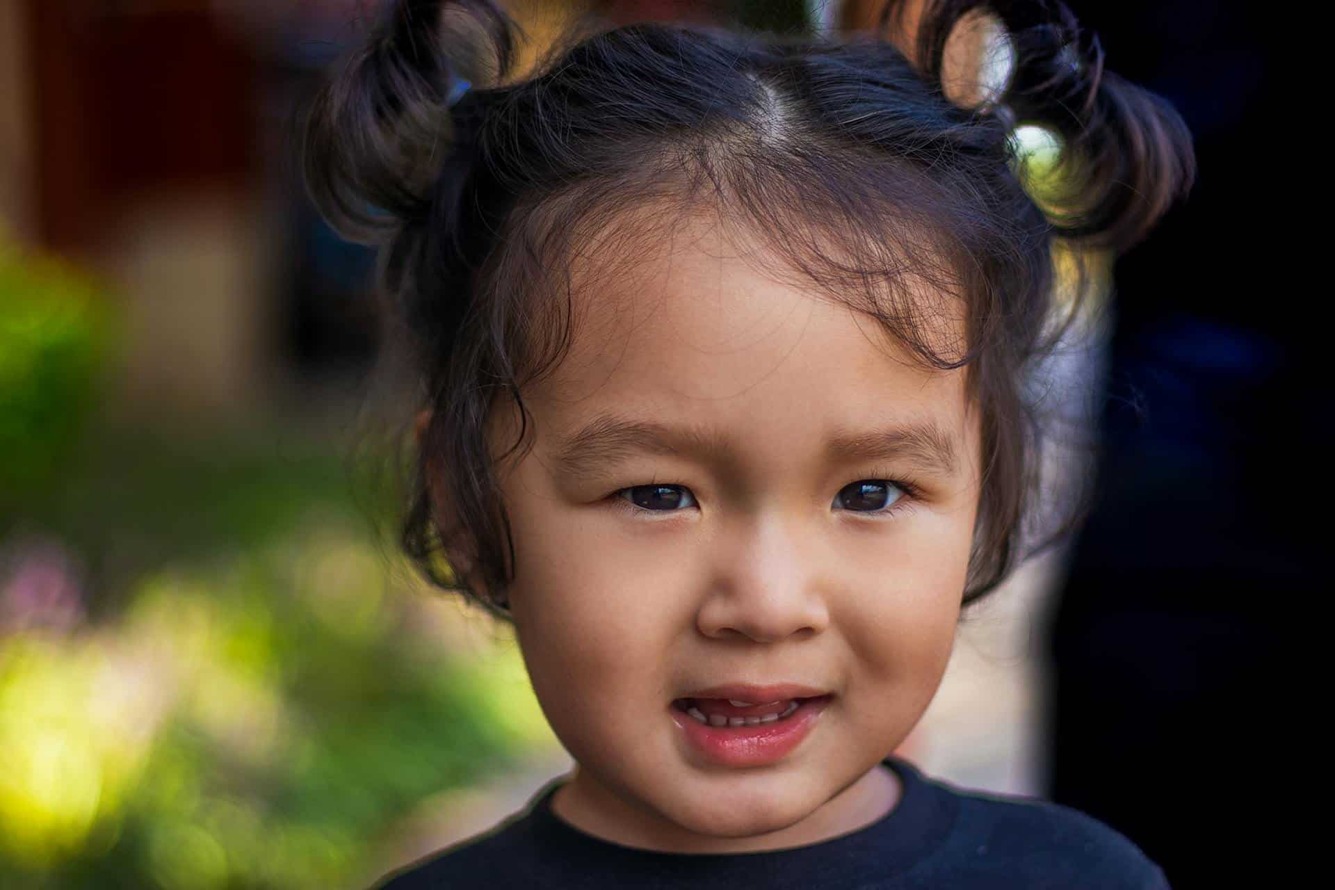 in-home aba therapy with girl smiling at the camera