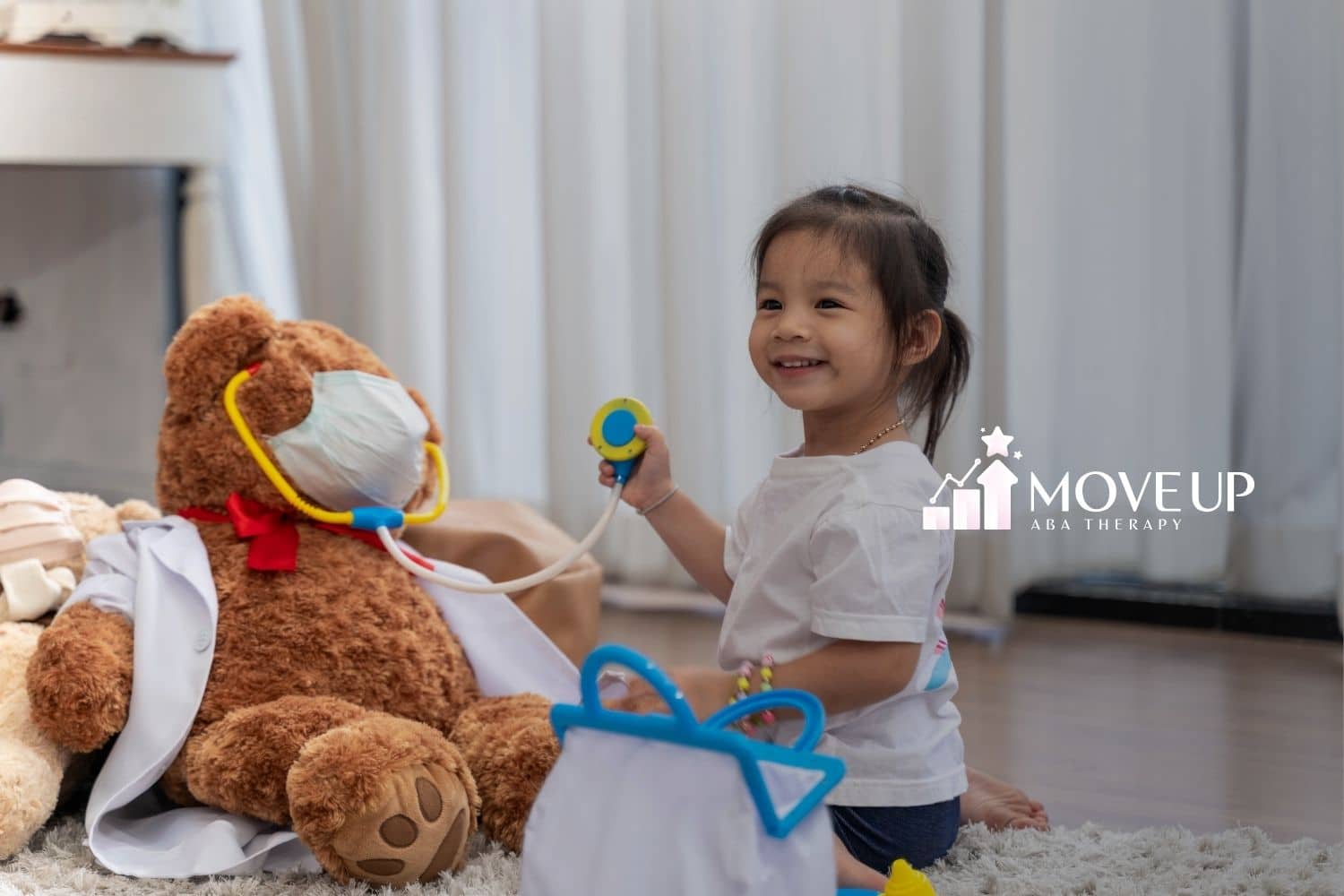 Image of a parent and therapist working together with a toddler during home-based ABA therapy for school readiness.