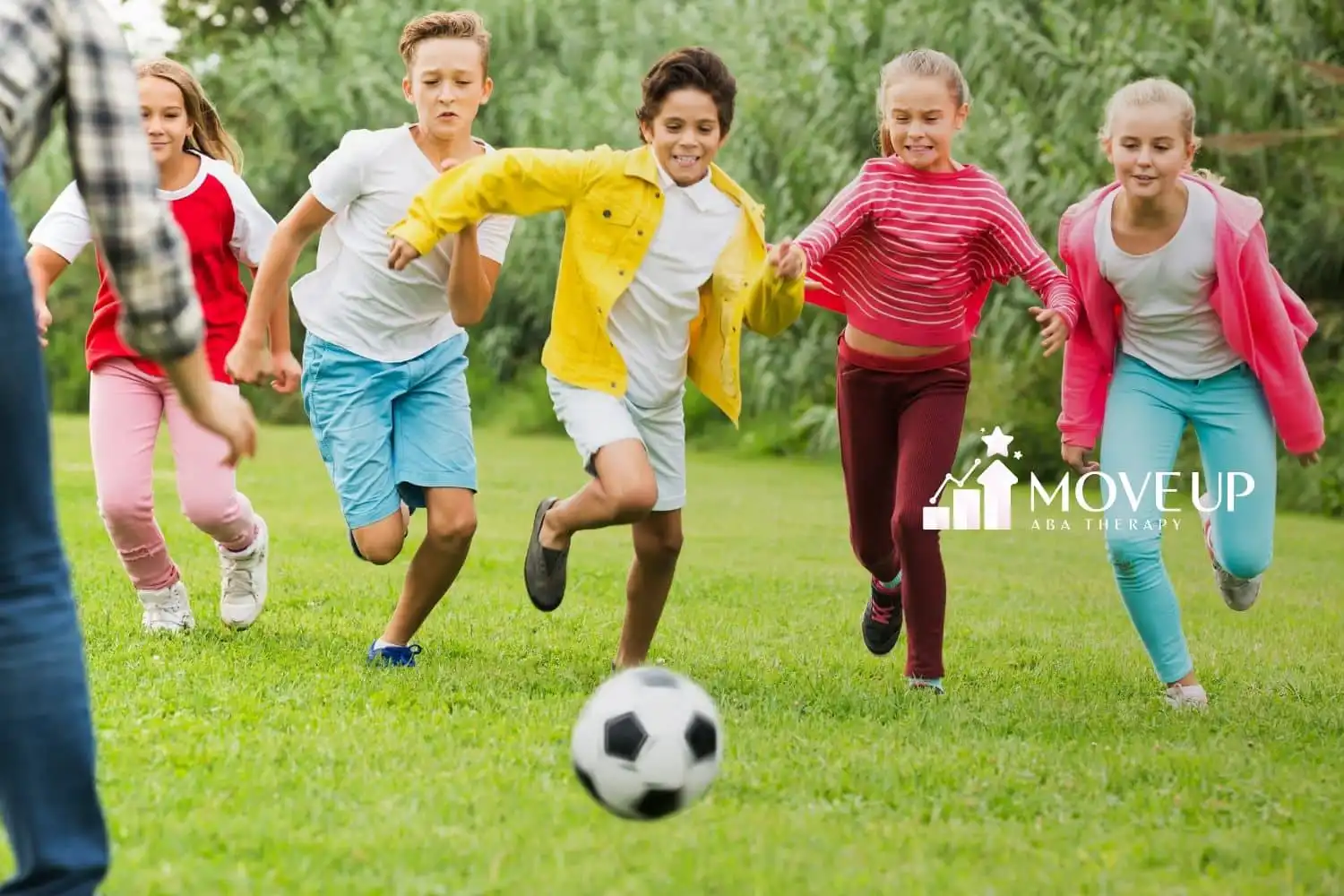 A group of kids playing soccer.