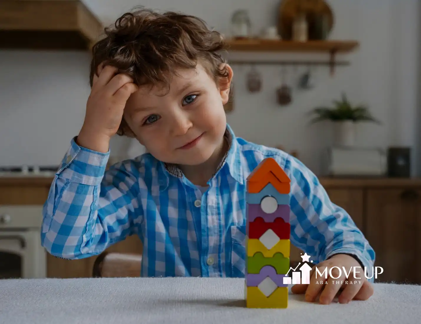 A child with autism playing with colorful wooden toys on a table