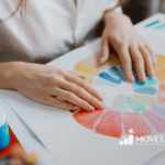 Close-up of an autistic kid's hands touching a colorful autism spectrum wheel chart on a table in Virginia.