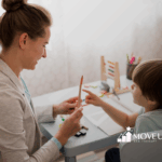 A child with autism and his RBT during in-home ABA therapy