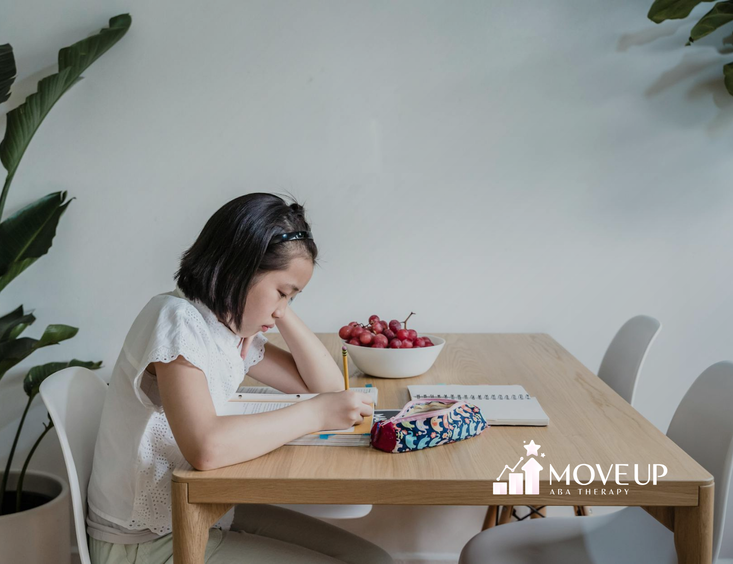 A mother and her autistic child playing in a living room