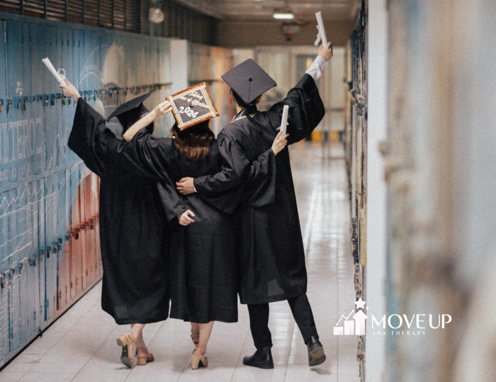 Rear view of three high school graduates in caps and gowns with arms raised holding diplomas, walking arm-in-arm down a school hallway lined with lockers.