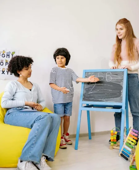 medical clinic ABA therapists teaching a kid his numbers